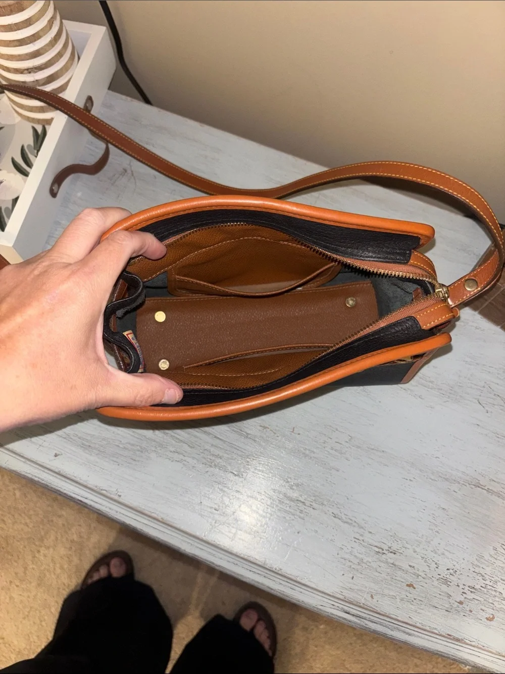 Dooney & Bourke Black Leather Crossbody with Brown Trim and Gold Hardware
